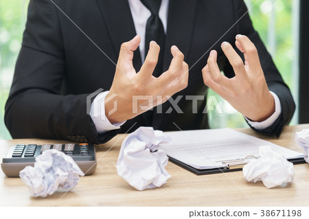 Stressed or angry businessman make a mistake Stressed or angry businessman make a mistake 38671198