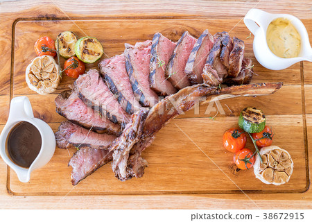 Grilled tomahawk steak 38672915