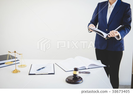 Judge gavel with Justice lawyers, Businesswoman in suit or lawye Judge gavel with Justice lawyers, Businesswoman in suit or lawye 38673405