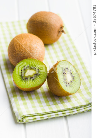 Halved kiwi fruit. 38674793