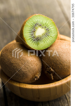 Halved kiwi fruit. 38674795