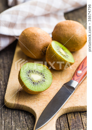 Halved kiwi fruit. 38674796