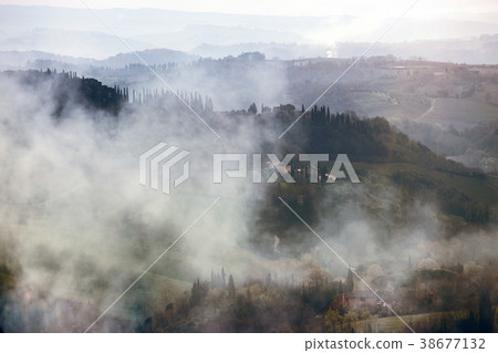 foggy morning at the Toscana 38677132