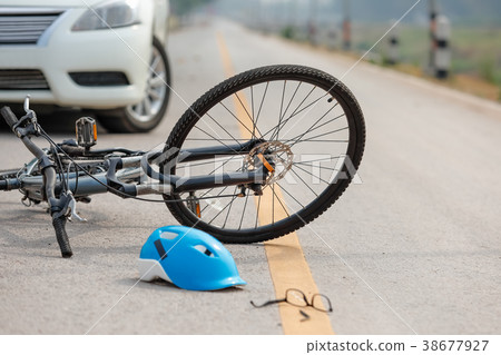 Accident car crash with bicycle on road 38677927