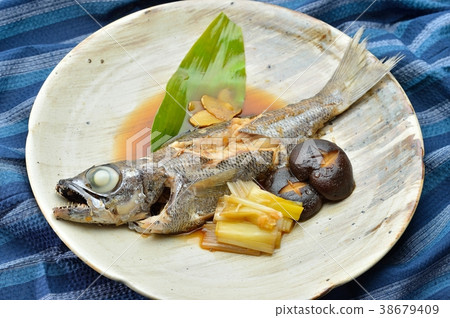 Simmered in black mout (croom and black muzu), boiled fish, Japanese food. 38679409