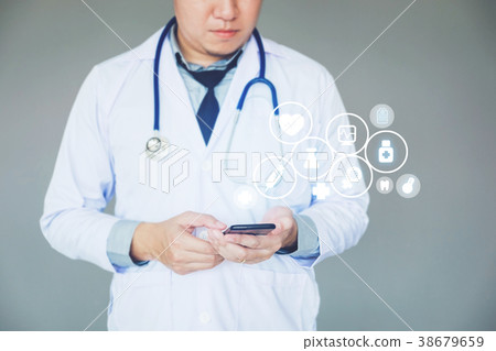 Doctor using smartphone and health care icon Doctor using smartphone and health care icon 38679659