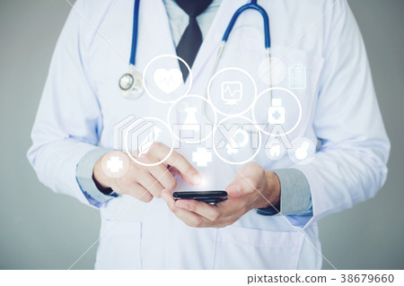 Doctor using smartphone and health care icon Doctor using smartphone and health care icon 38679660