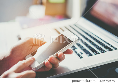 Man Typing Phone Message On Social Network 38679679