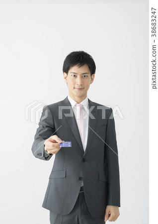 Businessmen offering credit cards 38683247