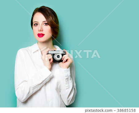 young woman with camera young woman with camera 38685158