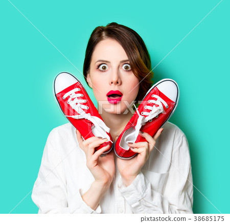 young woman with gumshoes 38685175