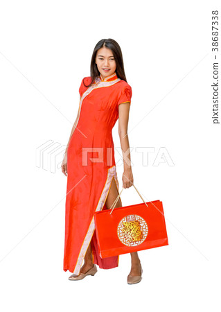 Chinese woman holding shopping bag, isolated Chinese woman holding shopping bag, isolated 38687338