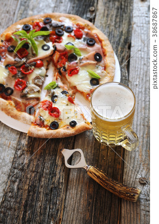 Appetizer: pizza and mug of lager beer 38687867