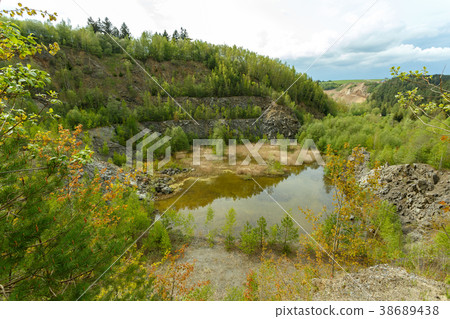 abandoned flooded quarry, Czech republic abandoned flooded quarry, Czech republic 38689438
