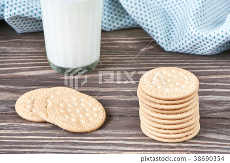 Glass with milk and cookies Glass with milk and cookies 38690354