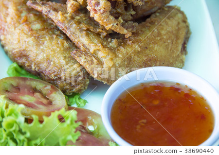 Fried chicken with fish sauce on modern plate, 38690440