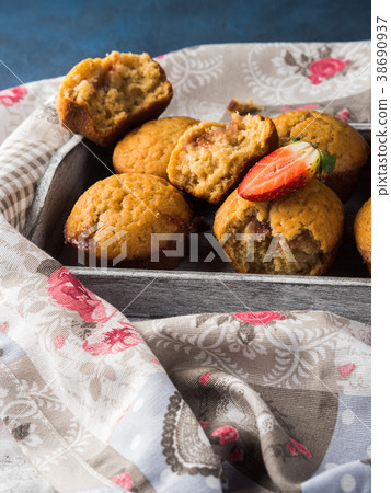 Peanut butter muffins with strawberry jam Peanut butter muffins with strawberry jam 38690937
