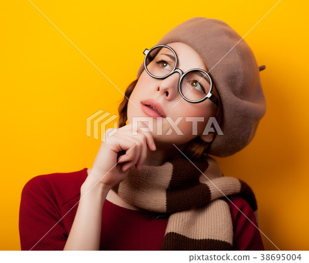 nerd girl with scarf and eyeglasses 38695004