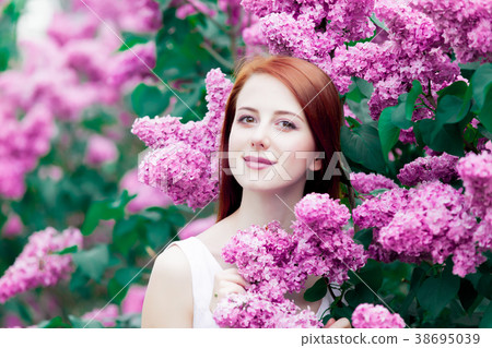 girl in lilac garden in springtime girl in lilac garden in springtime 38695039