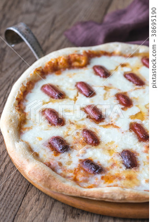 Pizza with mozzarella and salami Pizza with mozzarella and salami 38695190