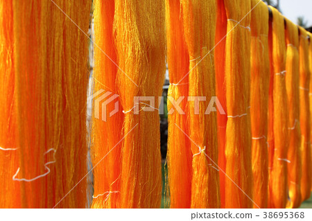 yellow raw silk thread 38695368