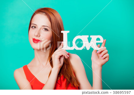 Redhead girl with word LOVE 38695597