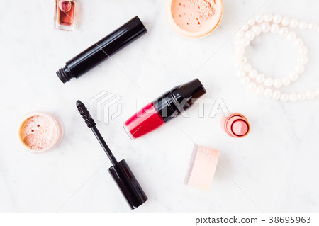 Woman makeup beauty products from above 38695963