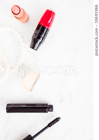 Woman makeup beauty products from above Woman makeup beauty products from above 38695966