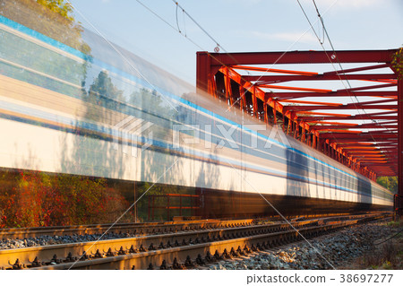 Speed train on the iron railway bridge, Speed train on the iron railway bridge, 38697277