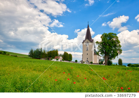 Lonely church in the field Lonely church in the field 38697279
