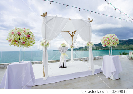 Wedding arch, altar decorated with roses, flowers Wedding arch, altar decorated with roses, flowers 38698361