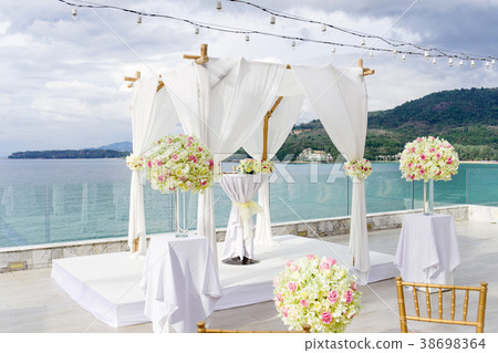 Wedding arch, altar decorated with roses, flowers 38698364