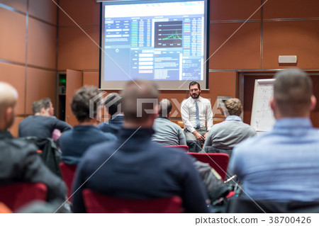 Skiled Public Speaker Giving a Talk at Business Skiled Public Speaker Giving a Talk at Business 38700426