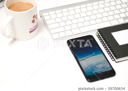 Computer, smart phone, keyboard, pen, coffee, keyboard, pen, notebook, notepad Computer, smart phone, keyboard, pen, coffee, keyboard, pen, notebook, notepad 38700634