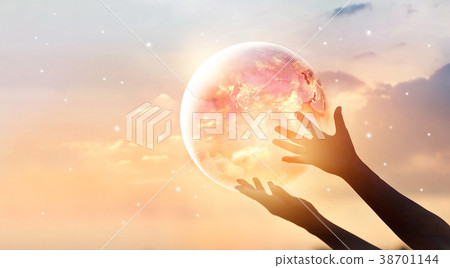Earth on human hands, save world energy concept 38701144