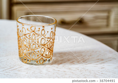 Glass with colorful hand painting Glass with colorful hand painting 38704491