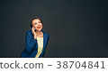 laughing business woman talking on phone 38704841