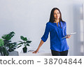 woman office worker, with tablet 38704844