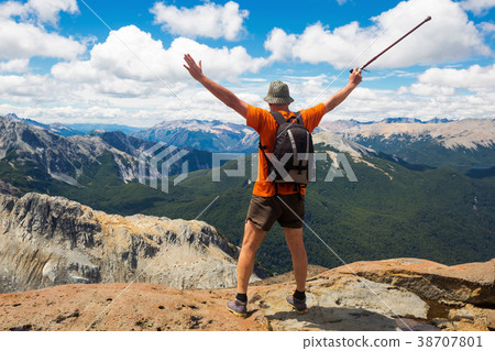 Elderly tourist climbed to top of cliff Elderly tourist climbed to top of cliff 38707801