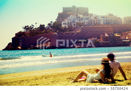 View of Peniscola castle from beach 38708424
