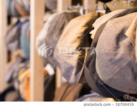 newboys cap hats hanging on the wall in mall 38708459