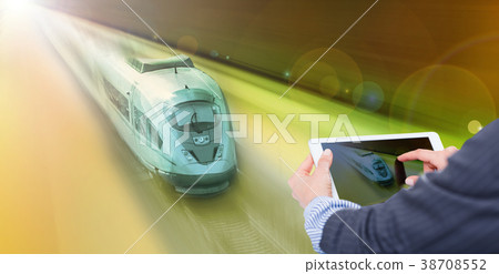 Female hands with tablet on train background Female hands with tablet on train background 38708552
