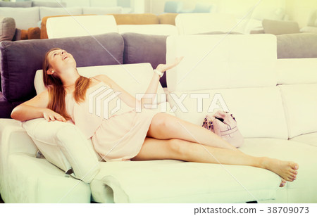 Portrait of woman buyer on the sofa 38709073