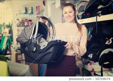 consumer with infant's car cradle consumer with infant's car cradle 38709074