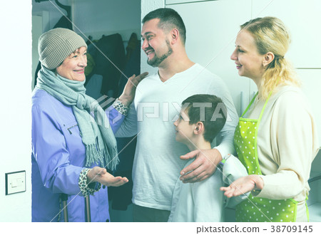 Grandma visiting children and grandson at home Grandma visiting children and grandson at home 38709145
