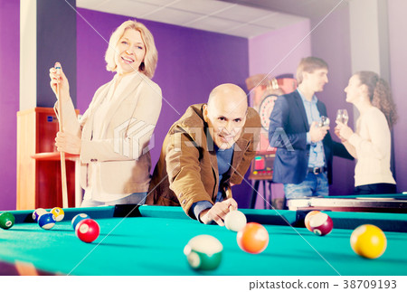 people having pool game 38709193