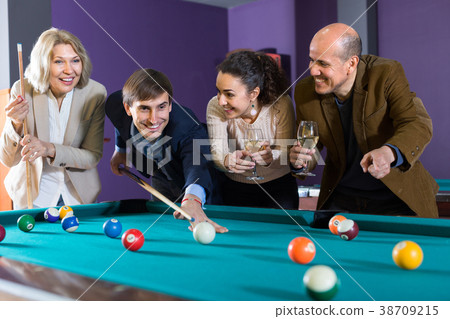 people having pool game 38709215
