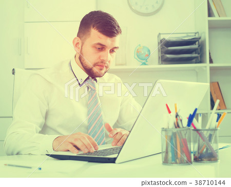 Man working productively 38710144