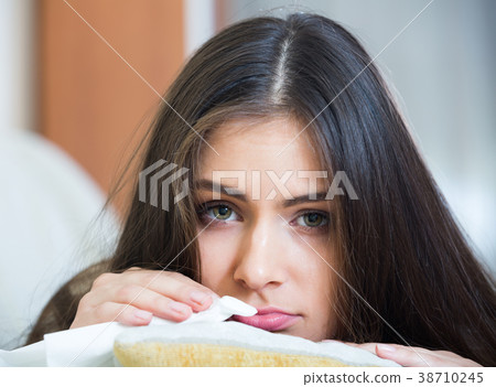 Upset adult girl at home. 38710245