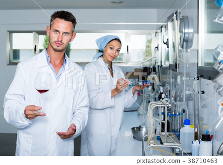 Attentive adult man testing wine qualities 38710463